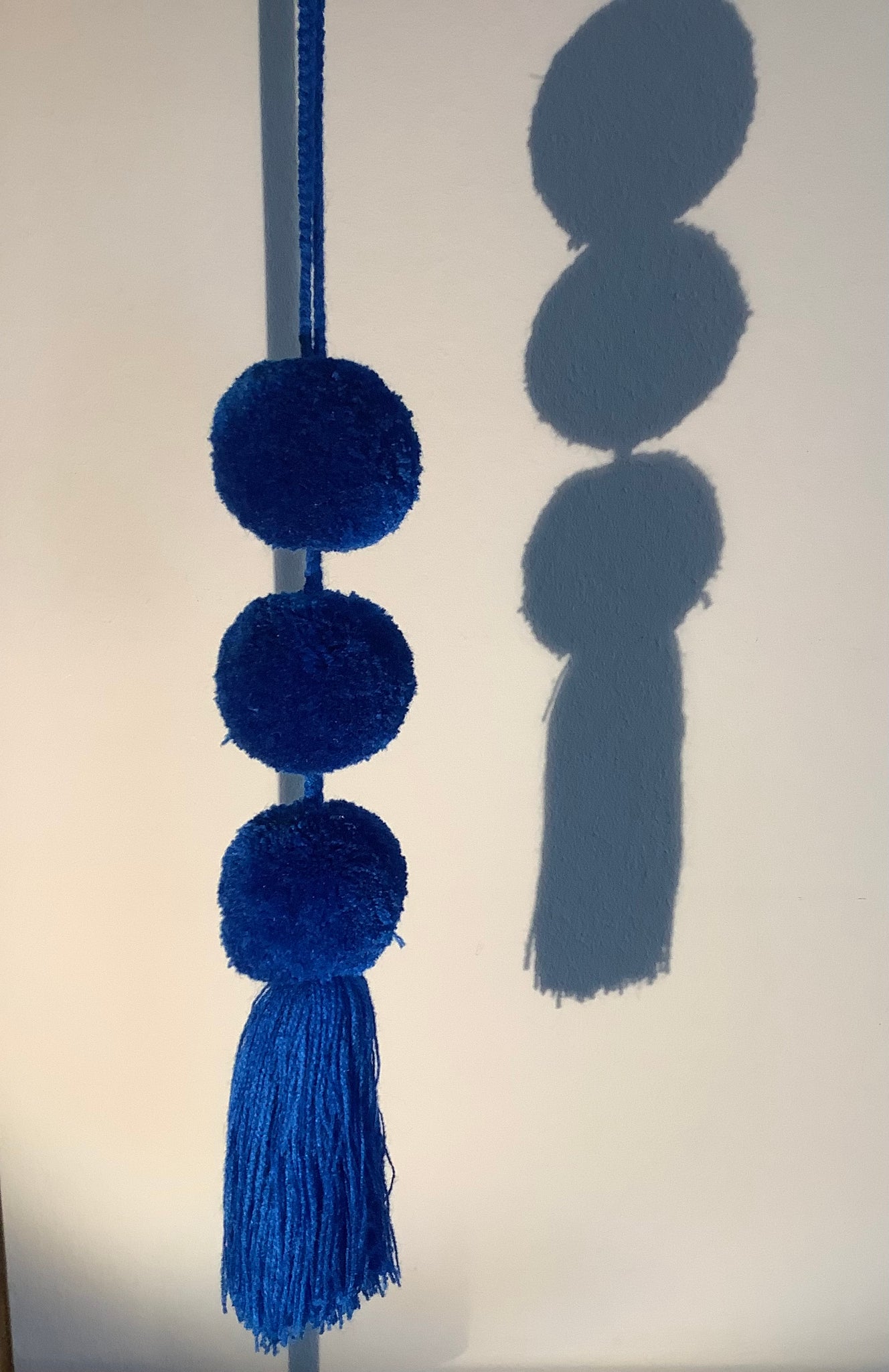 Tassel Drie pompons