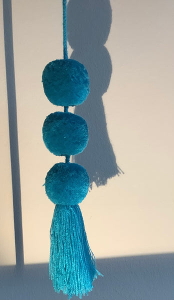 Tassel Drie pompons